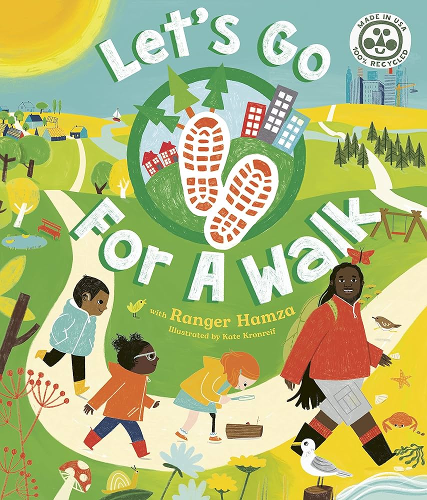 Three children and a man walk in the park. The book is titled let's go for a walk"