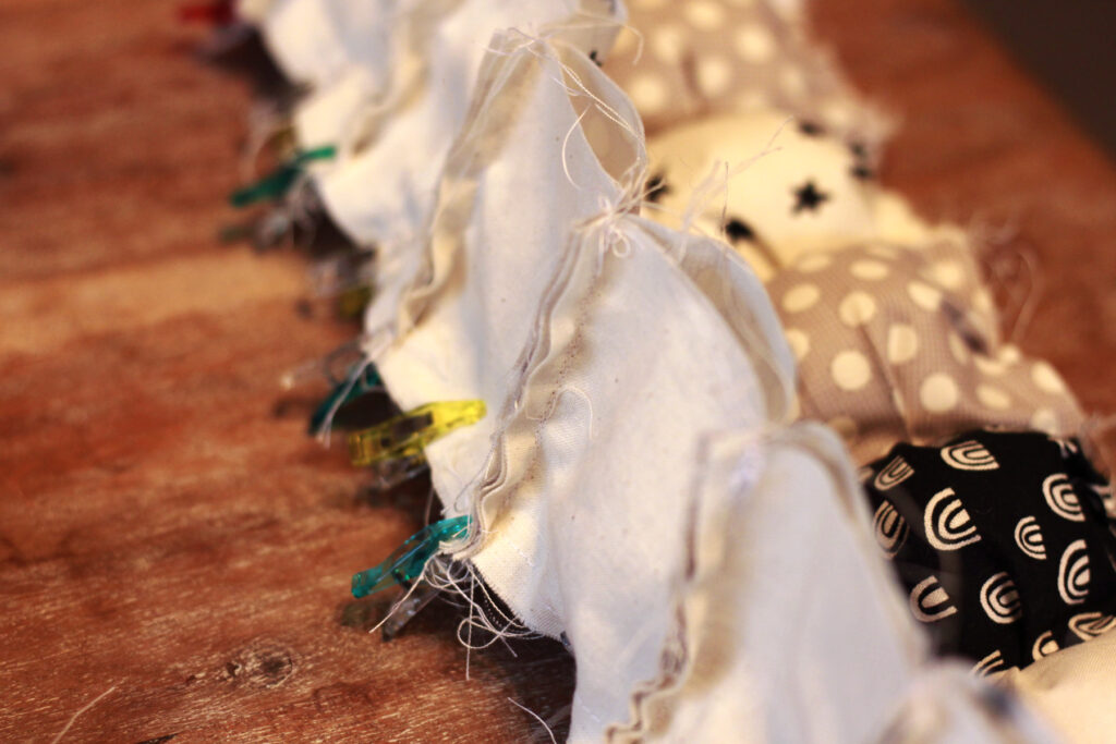 Rows of unstuffed puff squares attached to row of stuffed squares. 