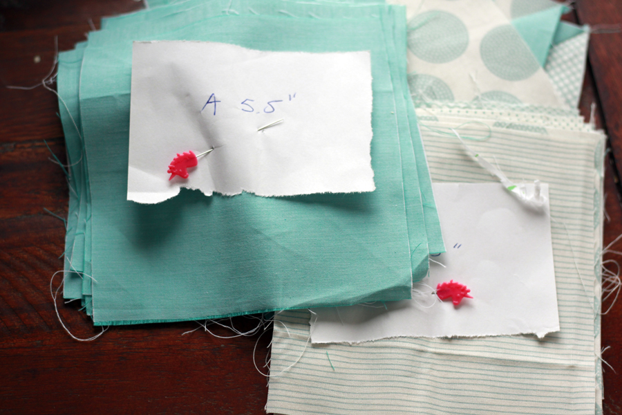 Piles of a quilting fabric the label reads, "A 5.5.""